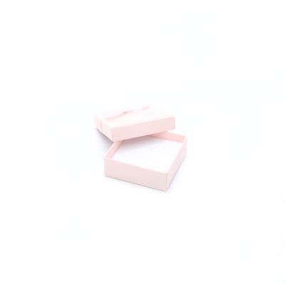 6x6x2.2cm. Pink gift box with ribbon bow.