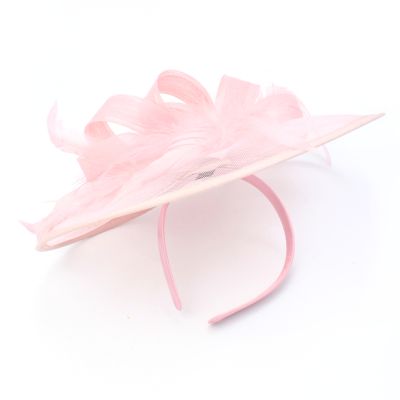 Style Doris. Dusky Pink net and feather fascinator on an aliceband