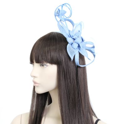 Style Ruby. Pale Blue sinamay flower fascinator with quills