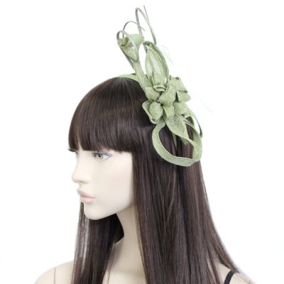 Style Ruby. Sage Green sinamay flower fascinator with quills