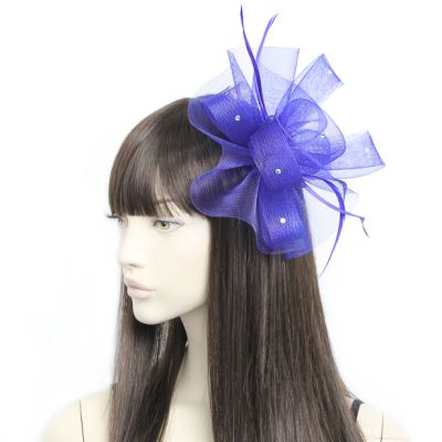 Style Luna. Dark Blue net fascinator on a clip