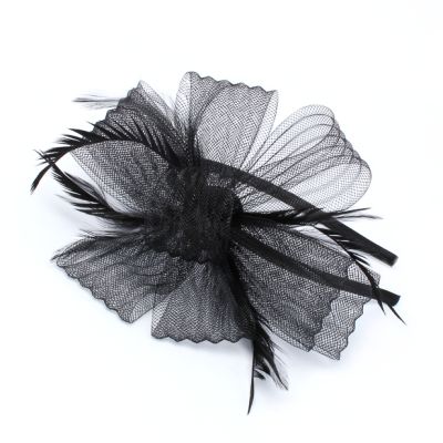 Style Freya. Looped net and feather fascinator on an aliceband